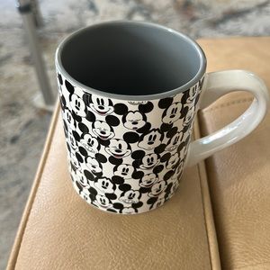 Disney’s many moods of Mickey, 14 ounce black, white and red coffee mug